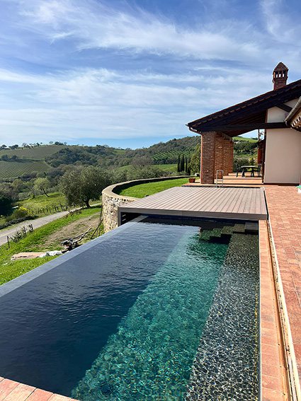 Italian villa infinity pool terrace finished with DURO 3.0 composite decking