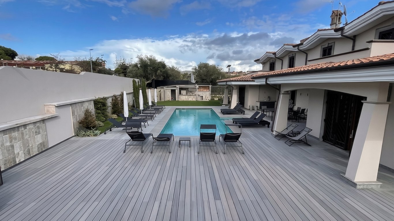 Poolside Italian villa terrace finished with DURO composite decking